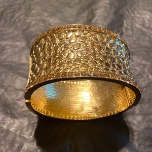 Like New HSN IMAN Hammered Gold Tone hinged  Cuff Bracelet